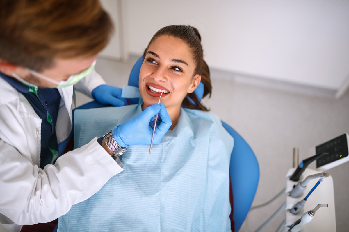 Beautiful woman on dental clinic