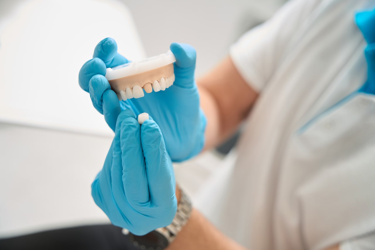 Orthodontist preparing to carry out dental procedure Stock Photo